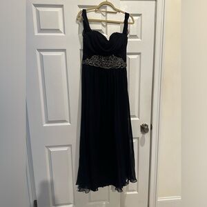 Navy blue off the shoulder gown.